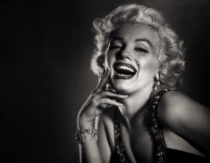 Marilyn Monroe laughing.