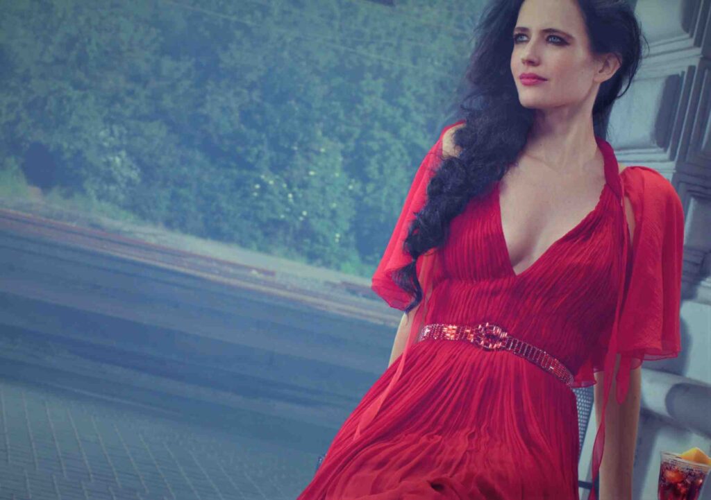 Eva Green sexy boobs showing in red sexy dress.