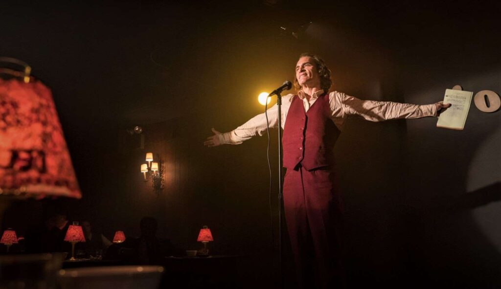 Arthur Fleck doing stand-up comedy in Joker 2019