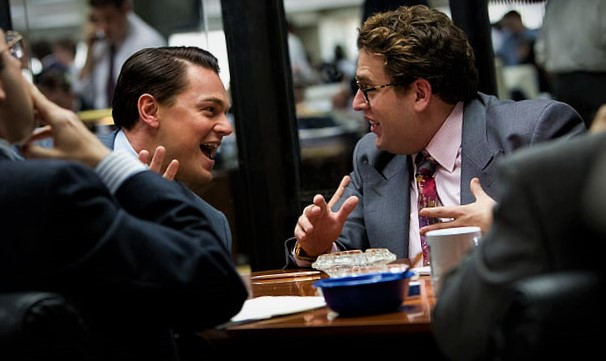 Leonardo DiCaprio as Jordan Belfort and Jonah Hill as Donnie Azoff in The Wolf of Wall Street.