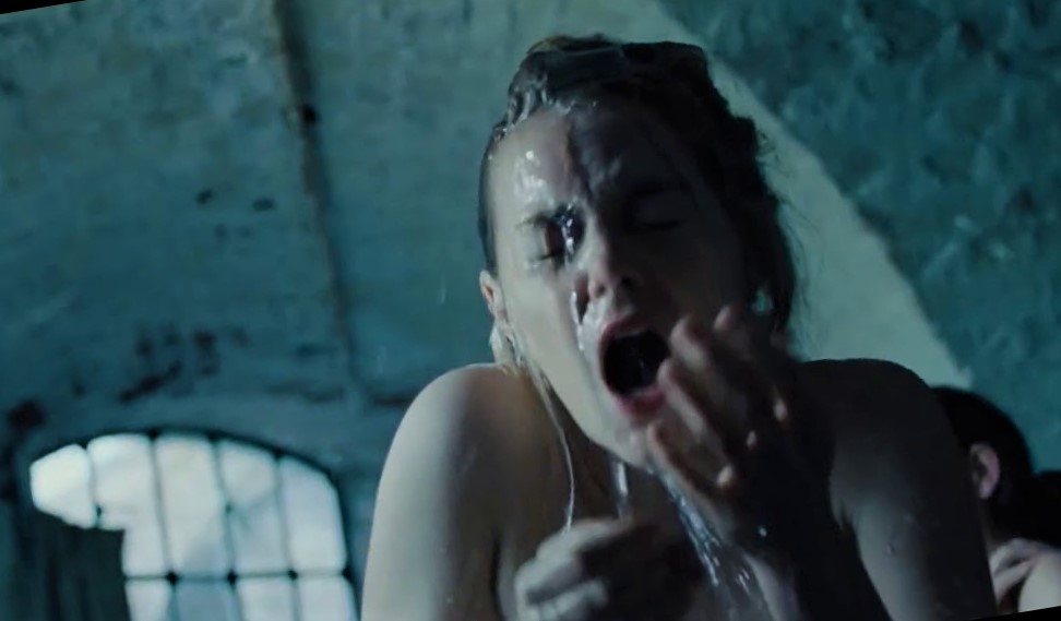 Naked Emma Stone taking a shower.