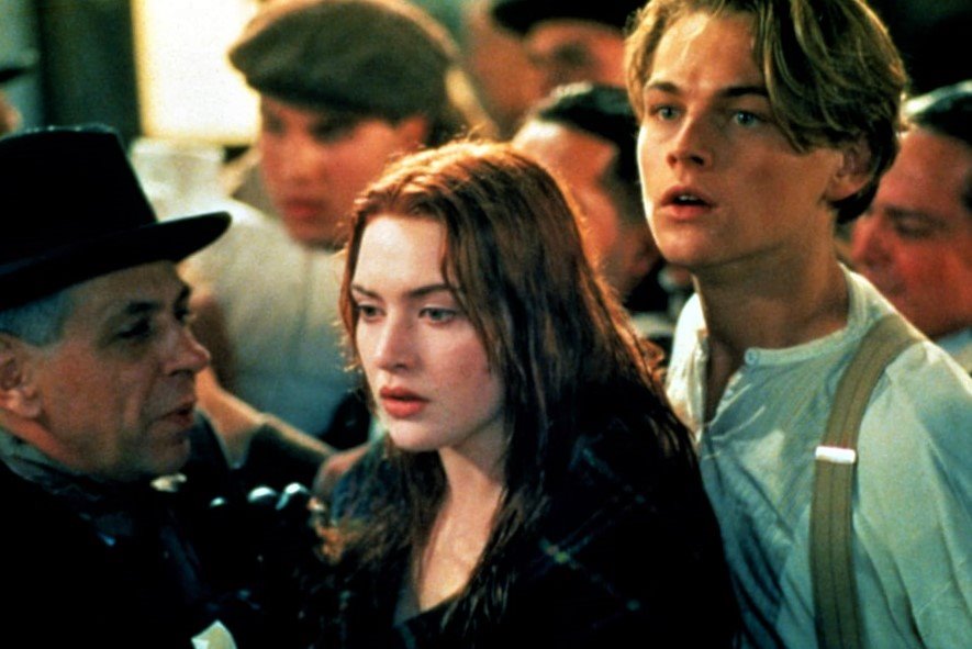 Rose and Jack trying to get on lifeboats in Titanic.