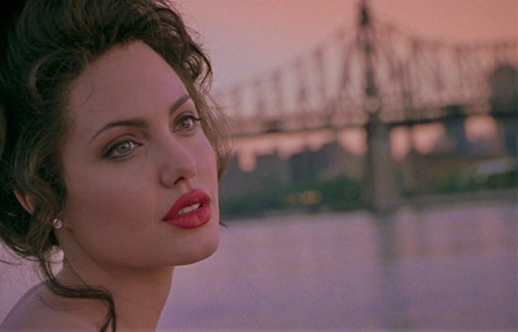 Angelina Jolie looking sexy as Gia Carangi in the biographical film Gia (1998).