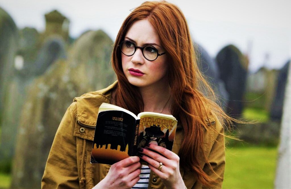 hot and sexy Scottish actress Karen Gillan looking cute in glasses.