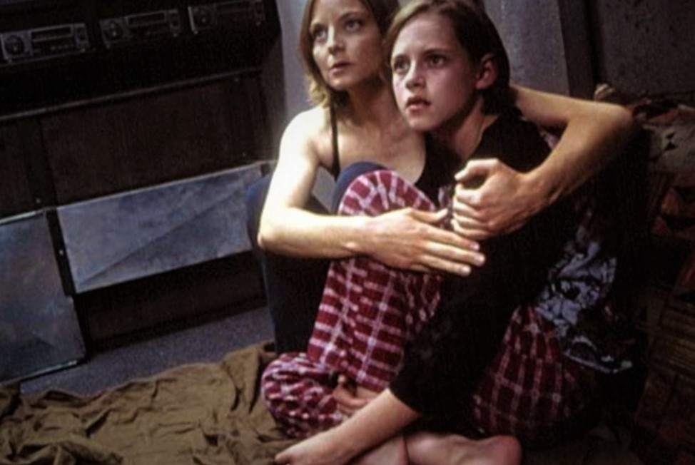 Jodie Foster with her co-star Kristen Stewart in 2002 horror film Panic Room. 