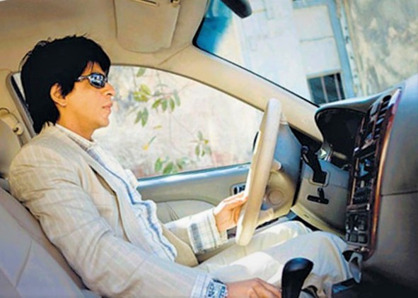 SRK driving his car.